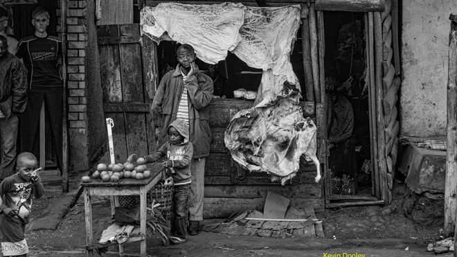 Photographing the Ugandan Medicine Man.